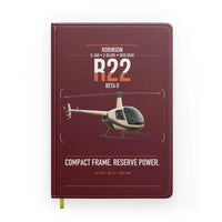 Thumbnail for Robinson R22 Beta II design on dark red notebook