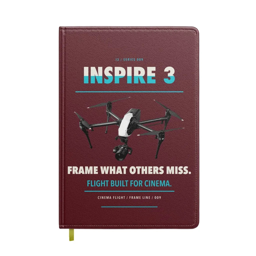 DJI Inspire 3 design on dark red notebook