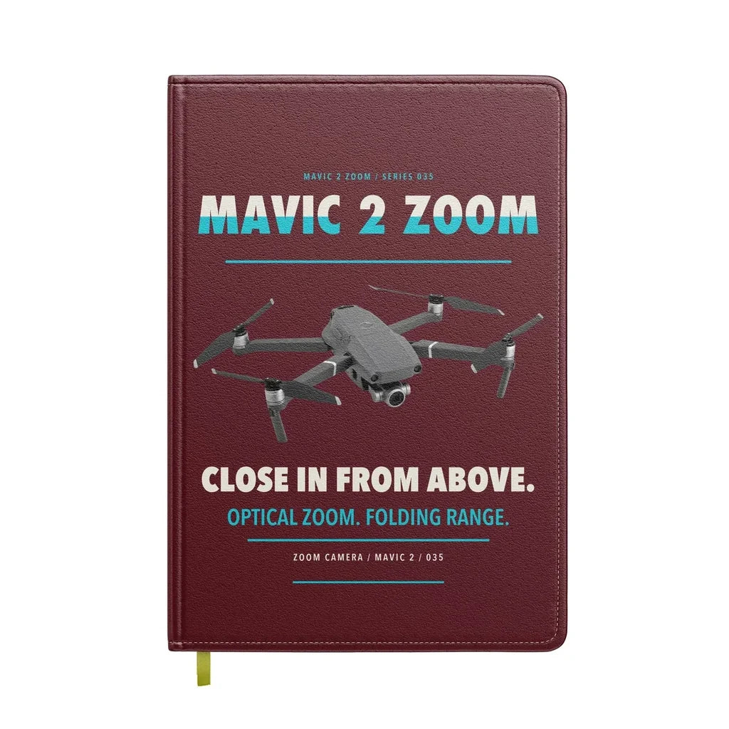 DJI Mavic 2 Zoom design on dark red notebook