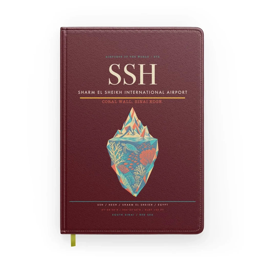 Sharm El Sheikh International Airport (SSH) design on dark red notebook