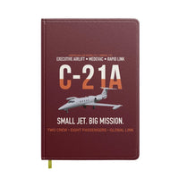 Thumbnail for C-21A Learjet Small Jet Big Mission design on dark red notebook