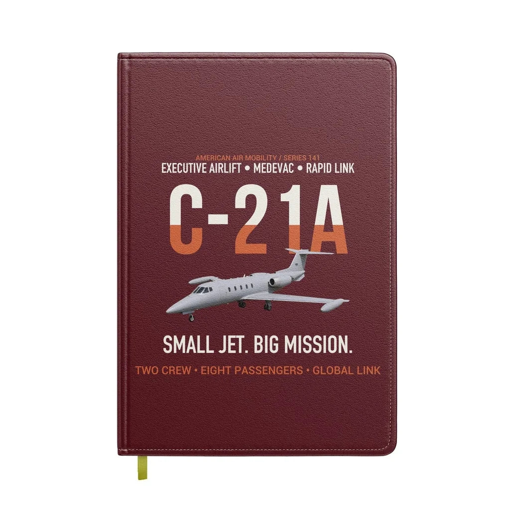 C-21A Learjet Small Jet Big Mission design on dark red notebook