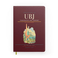 Thumbnail for Yamaguchi Ube Airport (UBJ) design on dark red notebook