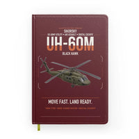 Thumbnail for Sikorsky UH-60M Black Hawk design on dark red notebook