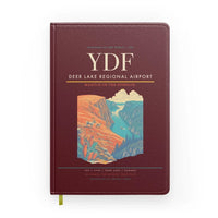 Thumbnail for Deer Lake Regional Airport (YDF) design on dark red notebook
