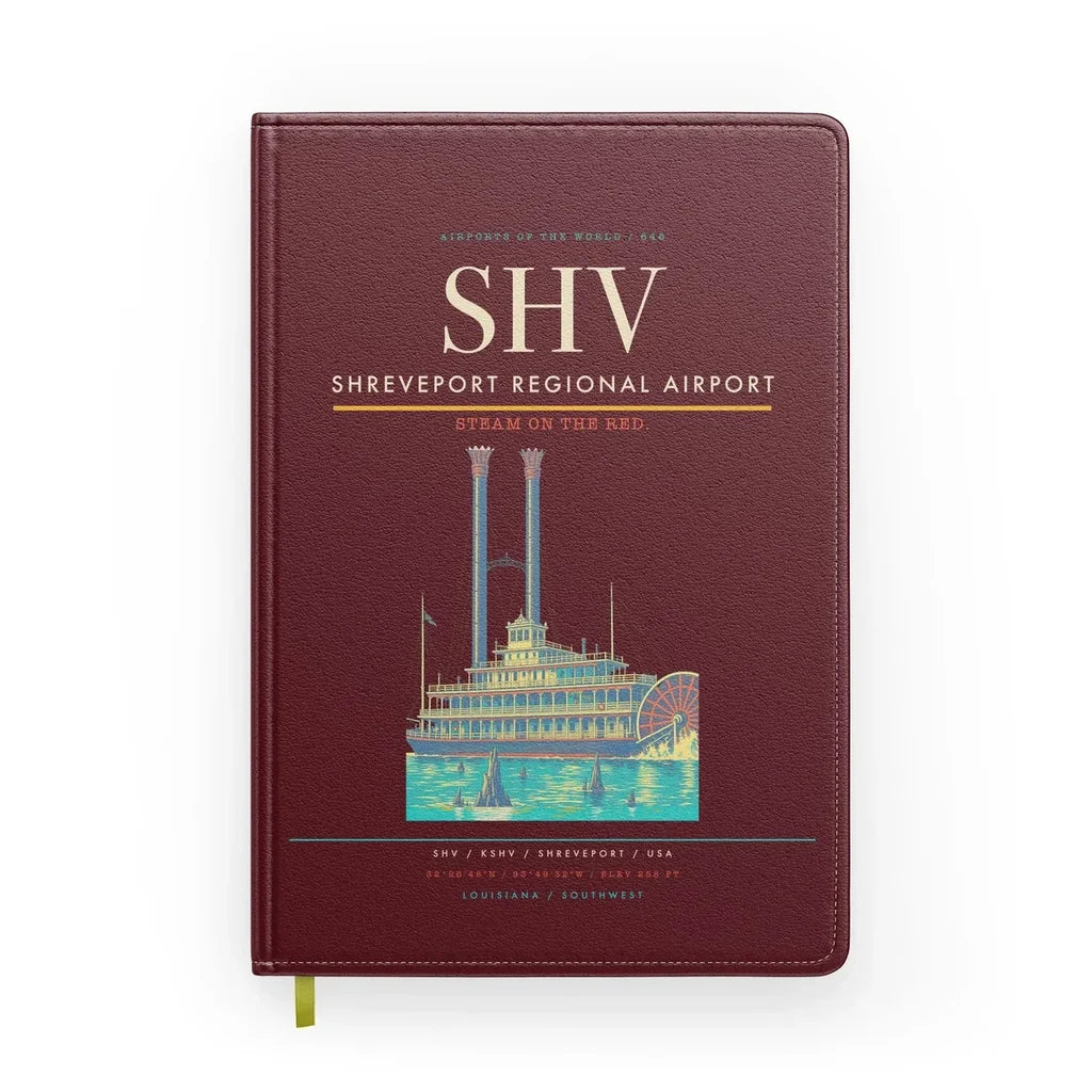 Shreveport Regional Airport (SHV) design on dark red notebook