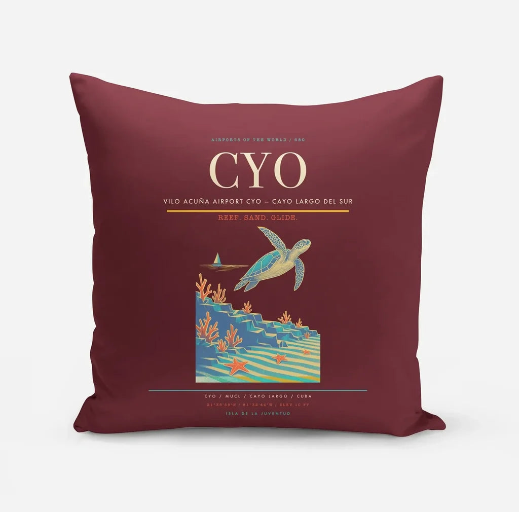 Vilo Acuña Airport (CYO) design on dark red pillow