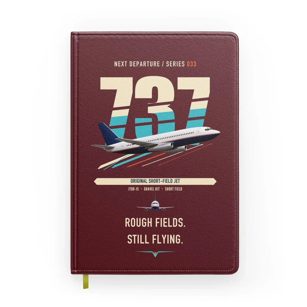 Boeing 737-200 design on dark red notebook
