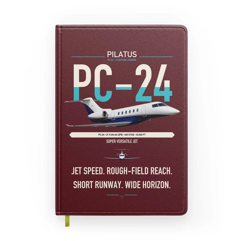 Pilatus PC-24 design on dark red notebook
