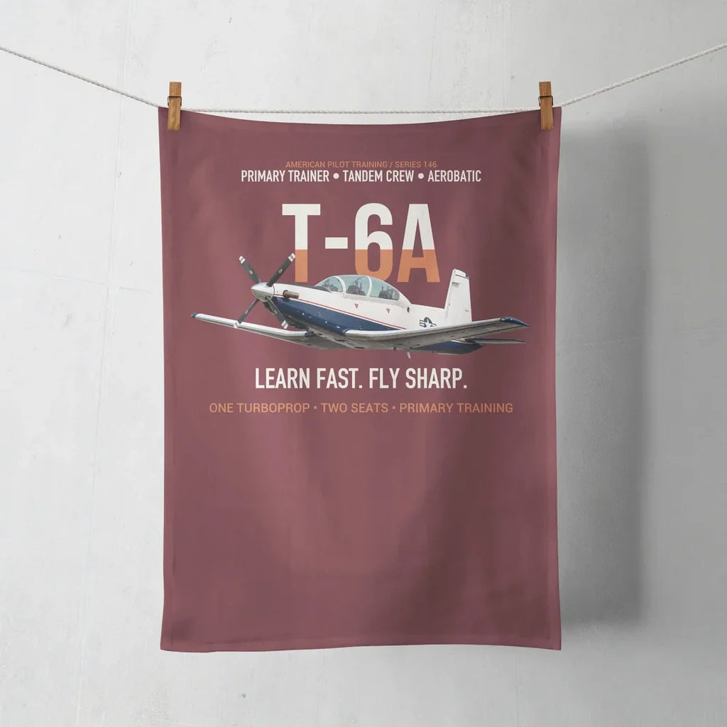 T-6A Texan II Train The Next Generation design on dark red towel