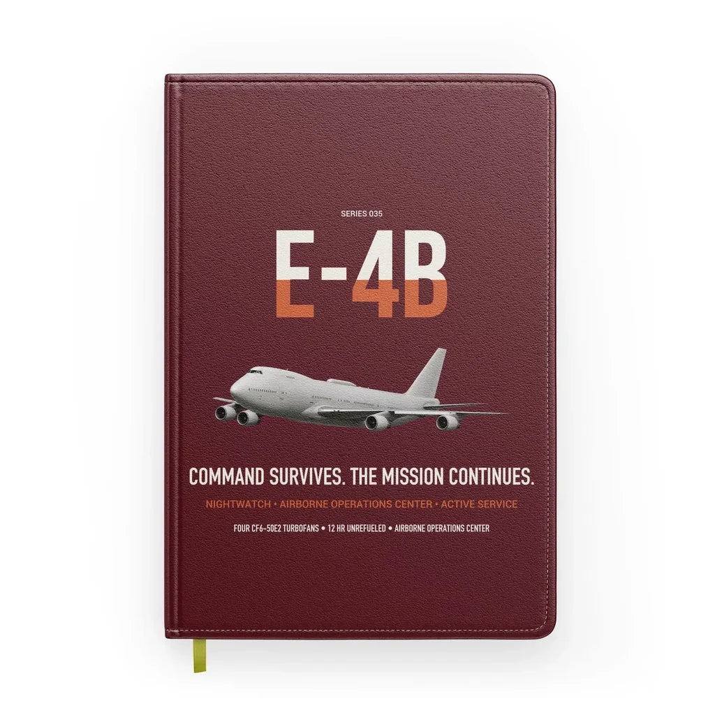 E-4B Nightwatch design on dark red notebook