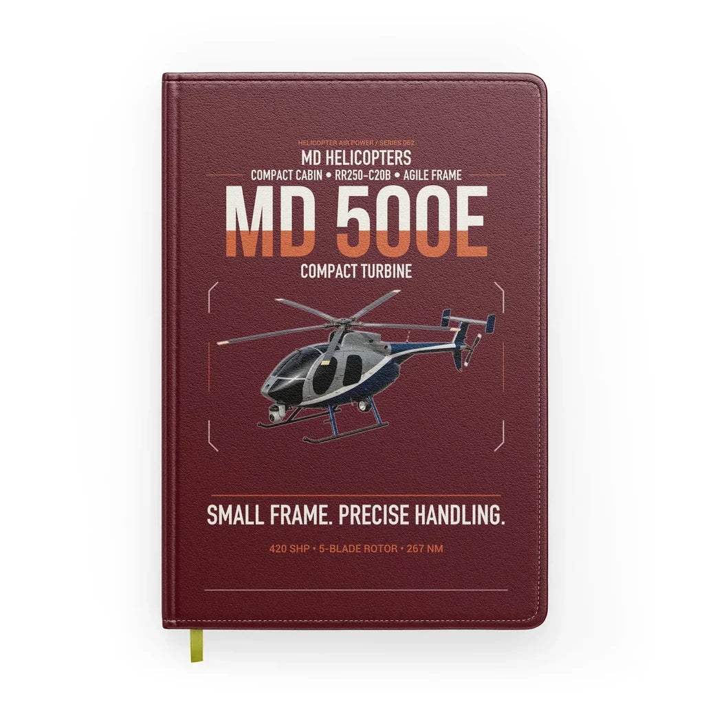 MD Helicopters MD 500E design on dark red notebook