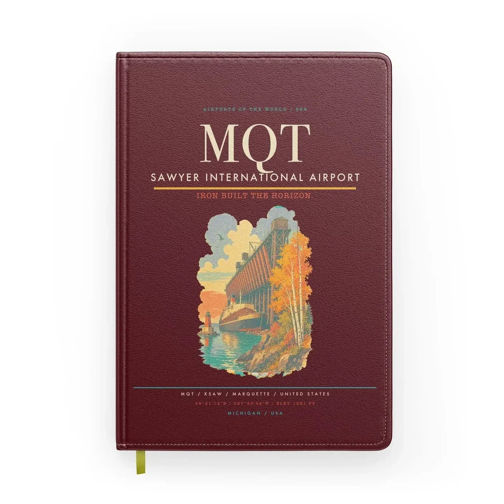Sawyer International Airport (MQT) design on dark red notebook