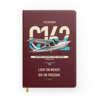Thumbnail for Cessna 162 Skycatcher design on dark red notebook