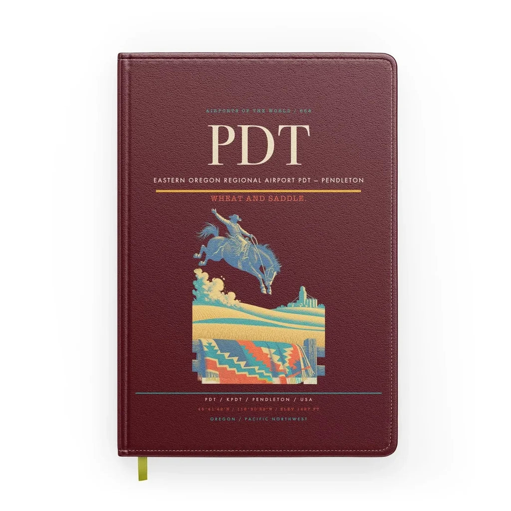 Eastern Oregon Regional Airport (PDT) design on dark red notebook