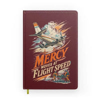 Thumbnail for Mercy Moves At Flight Speed design on dark red notebook
