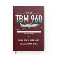 Thumbnail for Daher TBM 960 design on dark red notebook