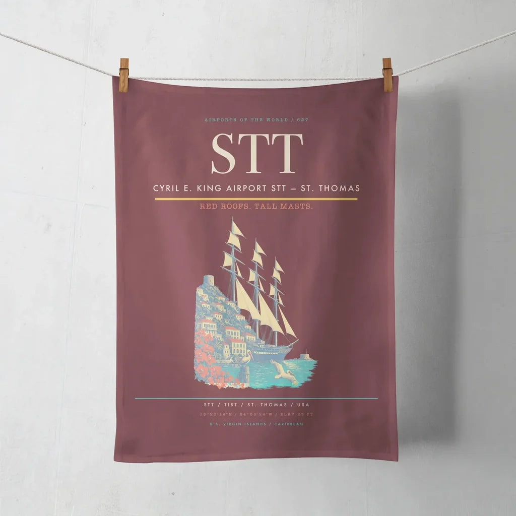 Cyril E. King Airport (STT) design on dark red towel