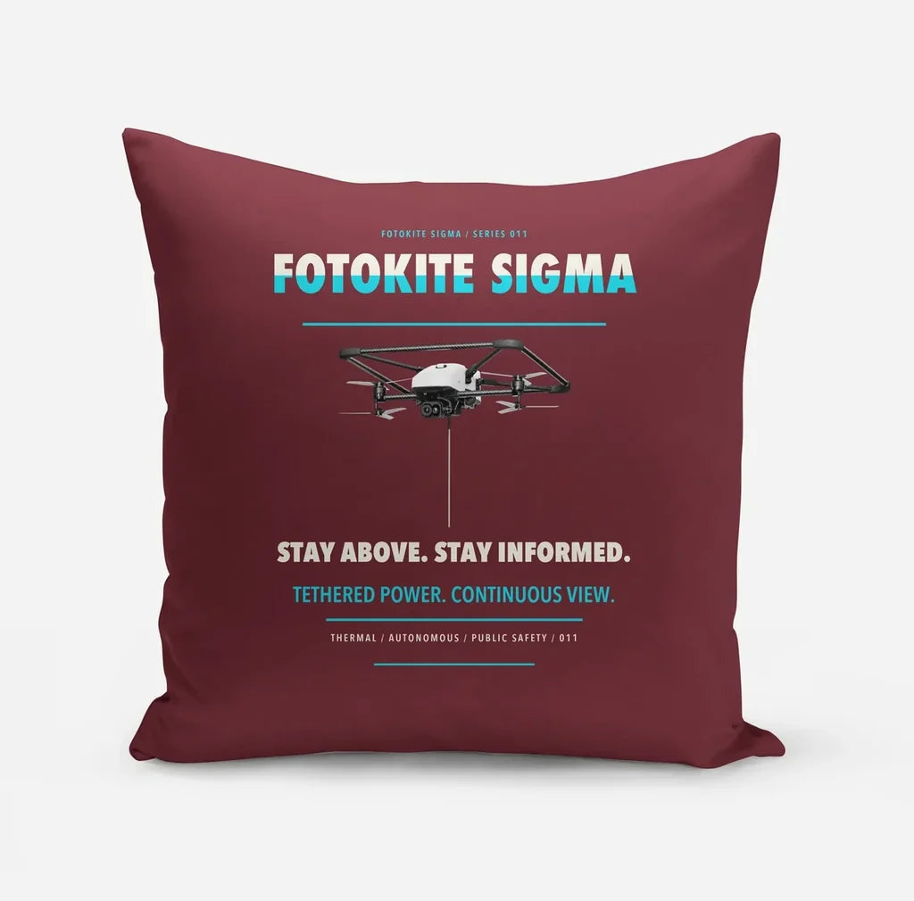 Fotokite Sigma design on dark red pillow