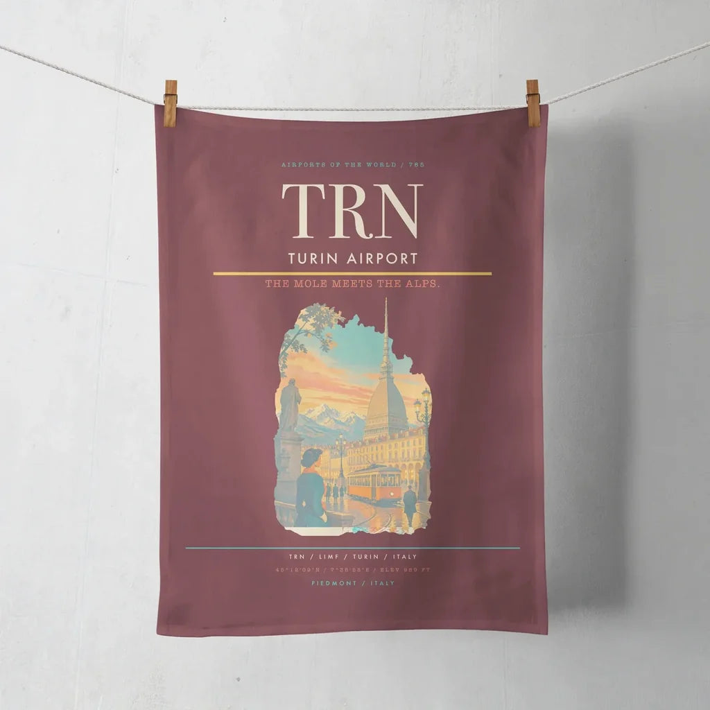 Turin Airport (TRN) design on dark red towel