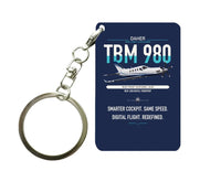 Thumbnail for Daher TBM 980 design on navy blue designed key chain, double-side print