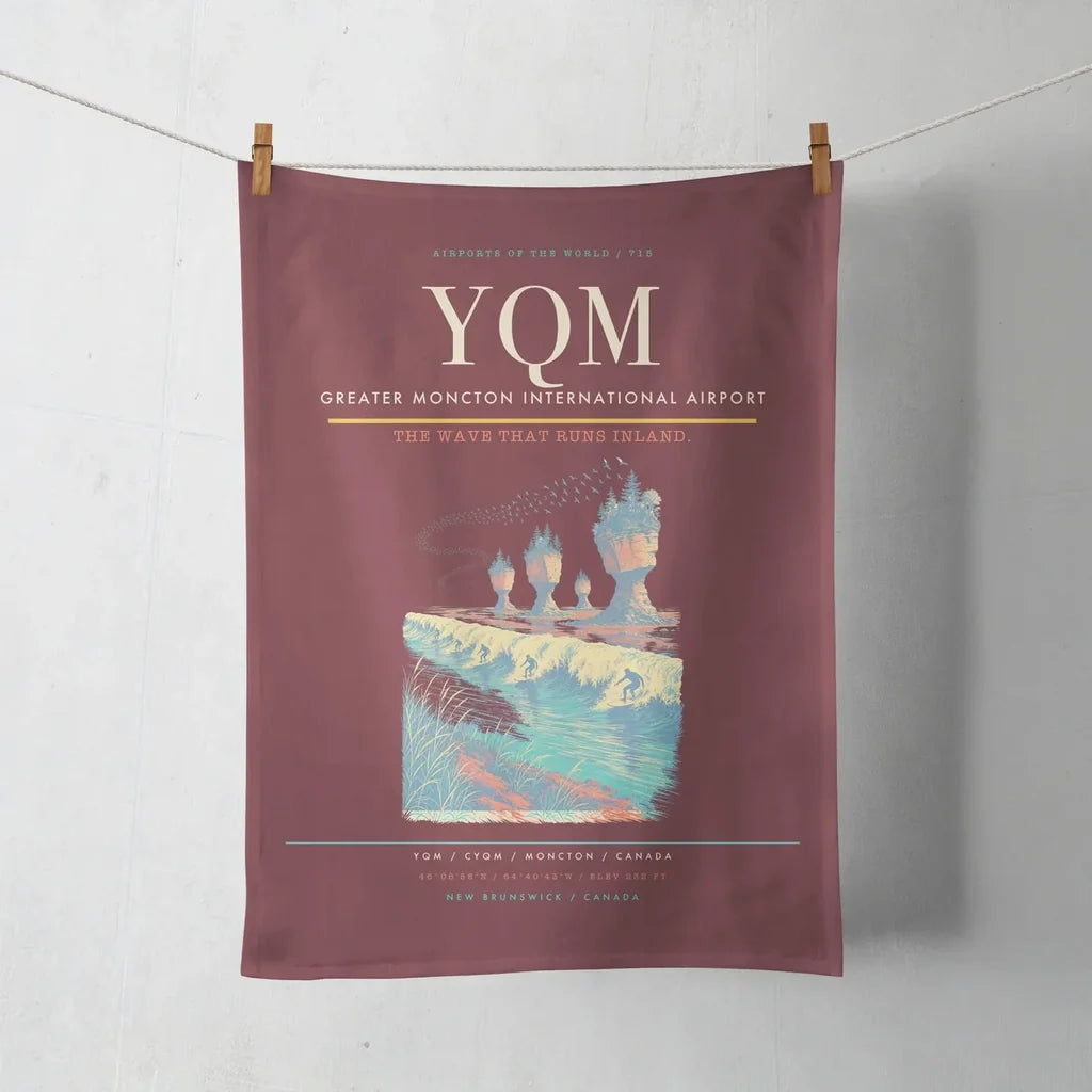 Greater Moncton International Airport (YQM) design on dark red towel