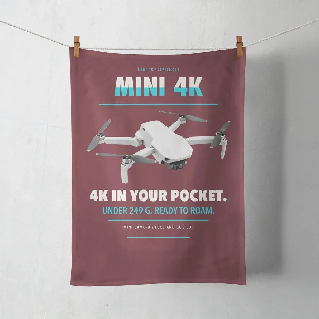 DJI Mini 4K design on dark red towel