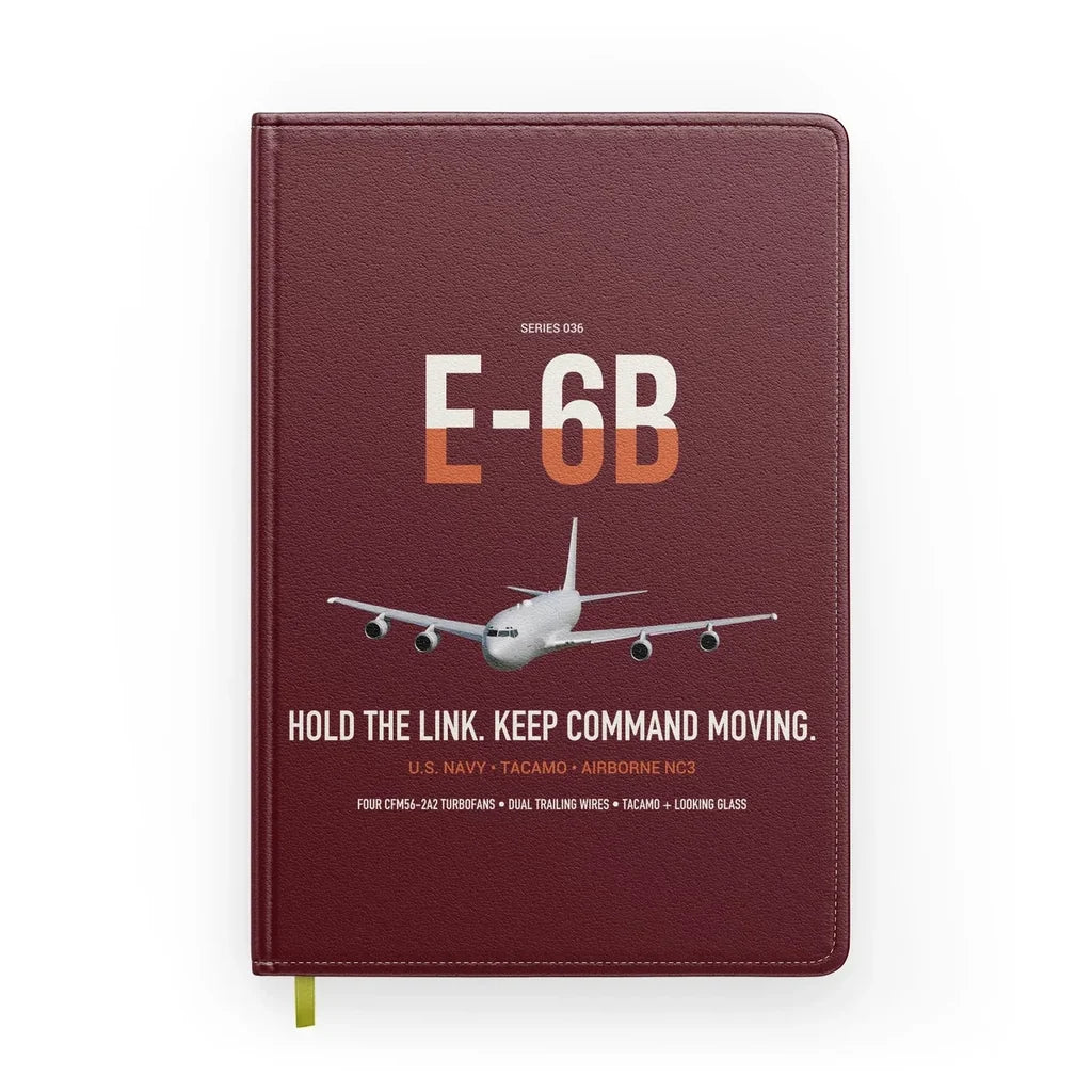 E-6B Mercury design on dark red notebook