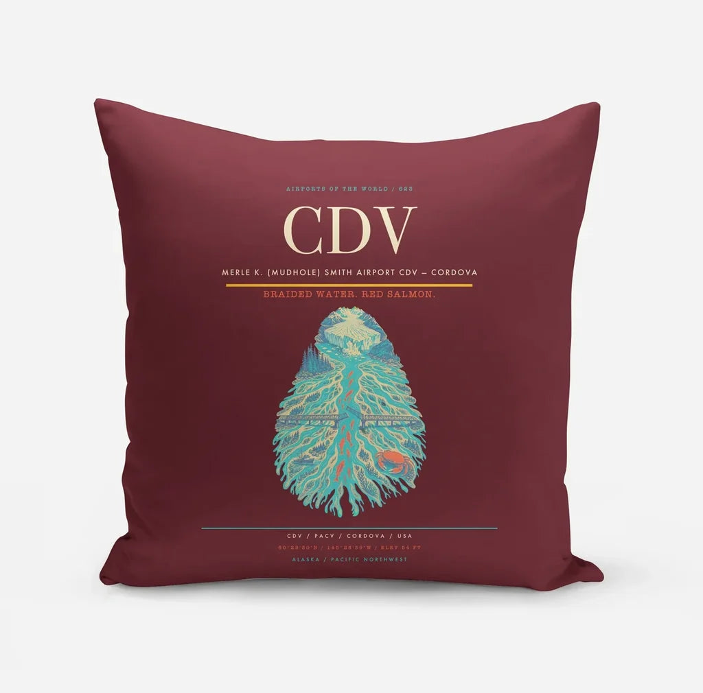 Merle K. (Mudhole) Smith Airport (CDV) design on dark red pillow