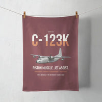 Thumbnail for C-123K Provider design on dark red towel