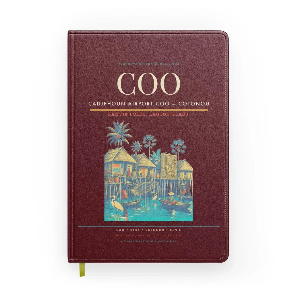 Cadjehoun Airport (COO) design on dark red notebook