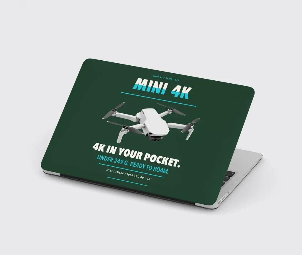 DJI Mini 4K design on dark green MacBook case