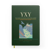 Thumbnail for Erik Nielsen Whitehorse International Airport (YXY) design on dark green notebook