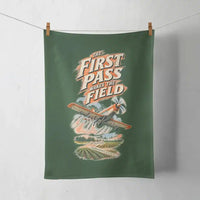 Thumbnail for The First Pass Wakes The Field design on dark green towel