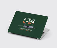 Thumbnail for C-5M Super Galaxy design on dark green MacBook case