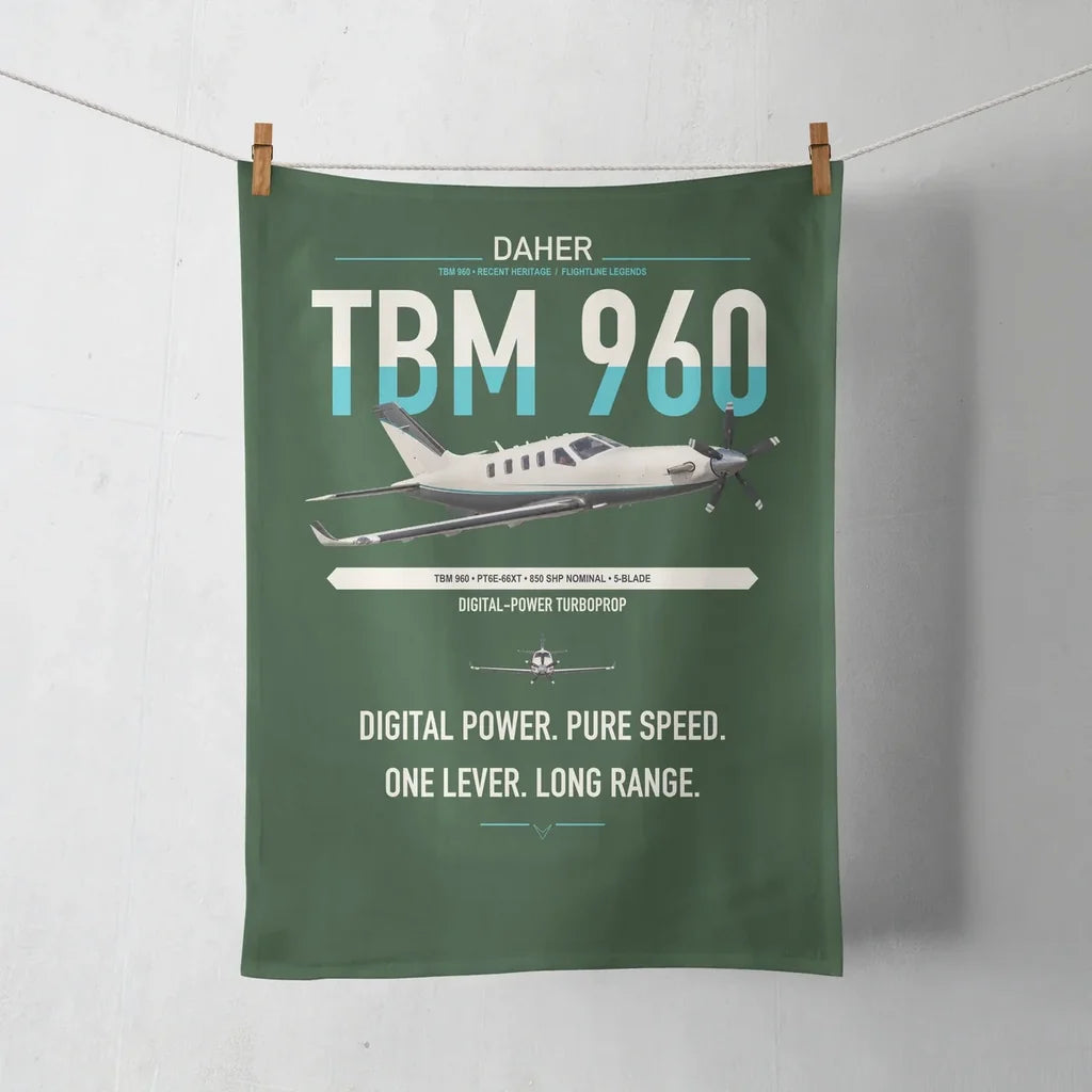 Daher TBM 960 design on dark green towel