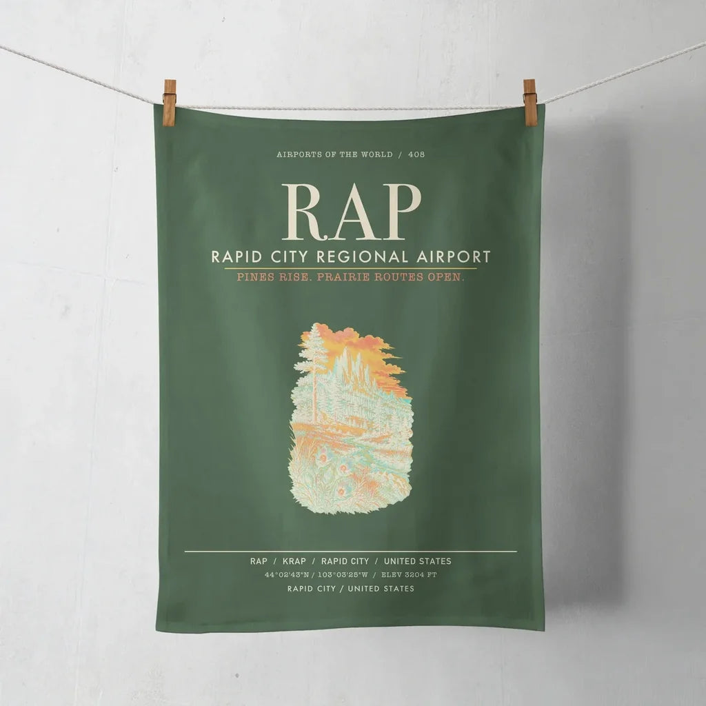 Rapid City Regional Airport (RAP) design on dark green towel
