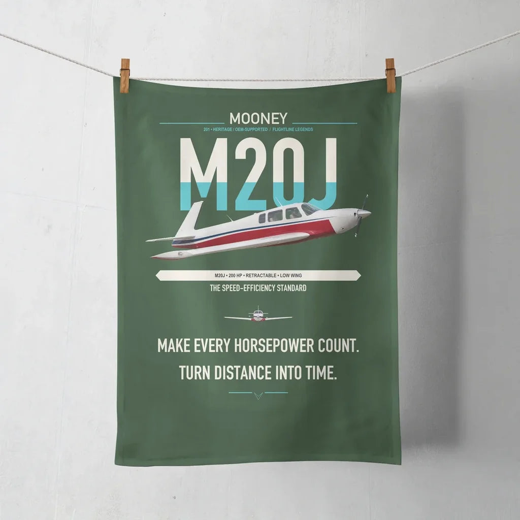 Mooney M20J 201 design on dark green towel