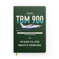 Thumbnail for Daher TBM 900 design on dark green notebook