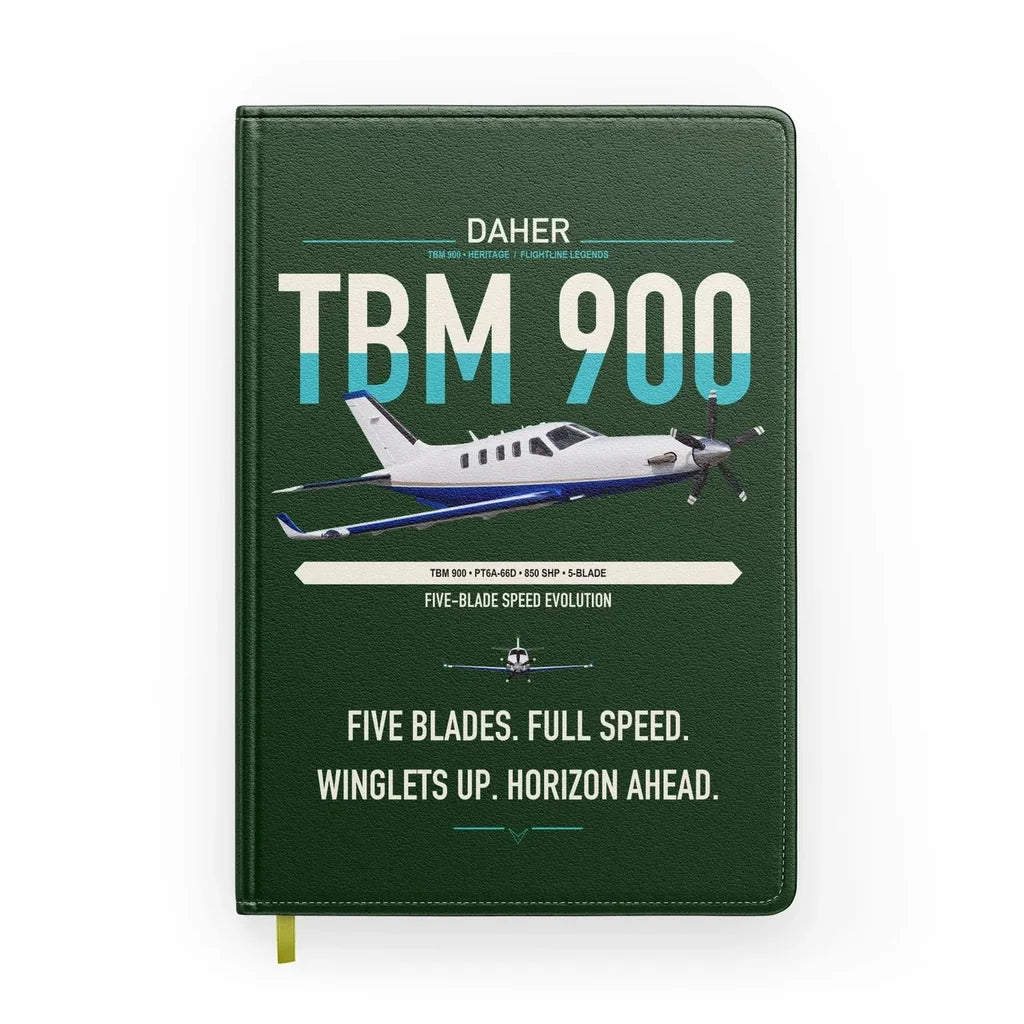 Daher TBM 900 design on dark green notebook