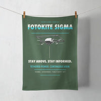 Thumbnail for Fotokite Sigma design on dark green towel