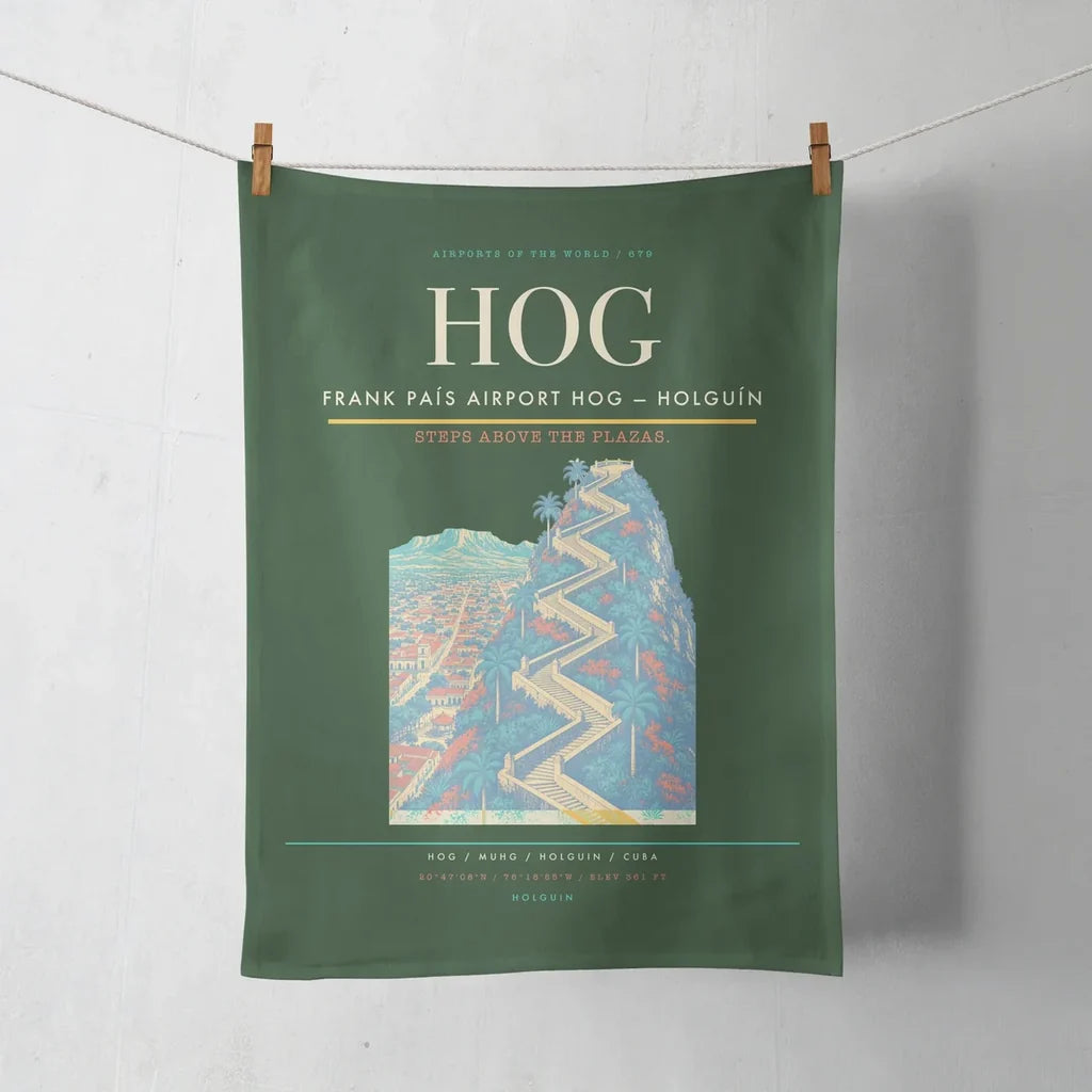 Frank País Airport (HOG) design on dark green towel