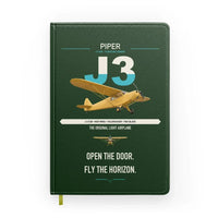 Thumbnail for Piper J-3 Cub design on dark green notebook
