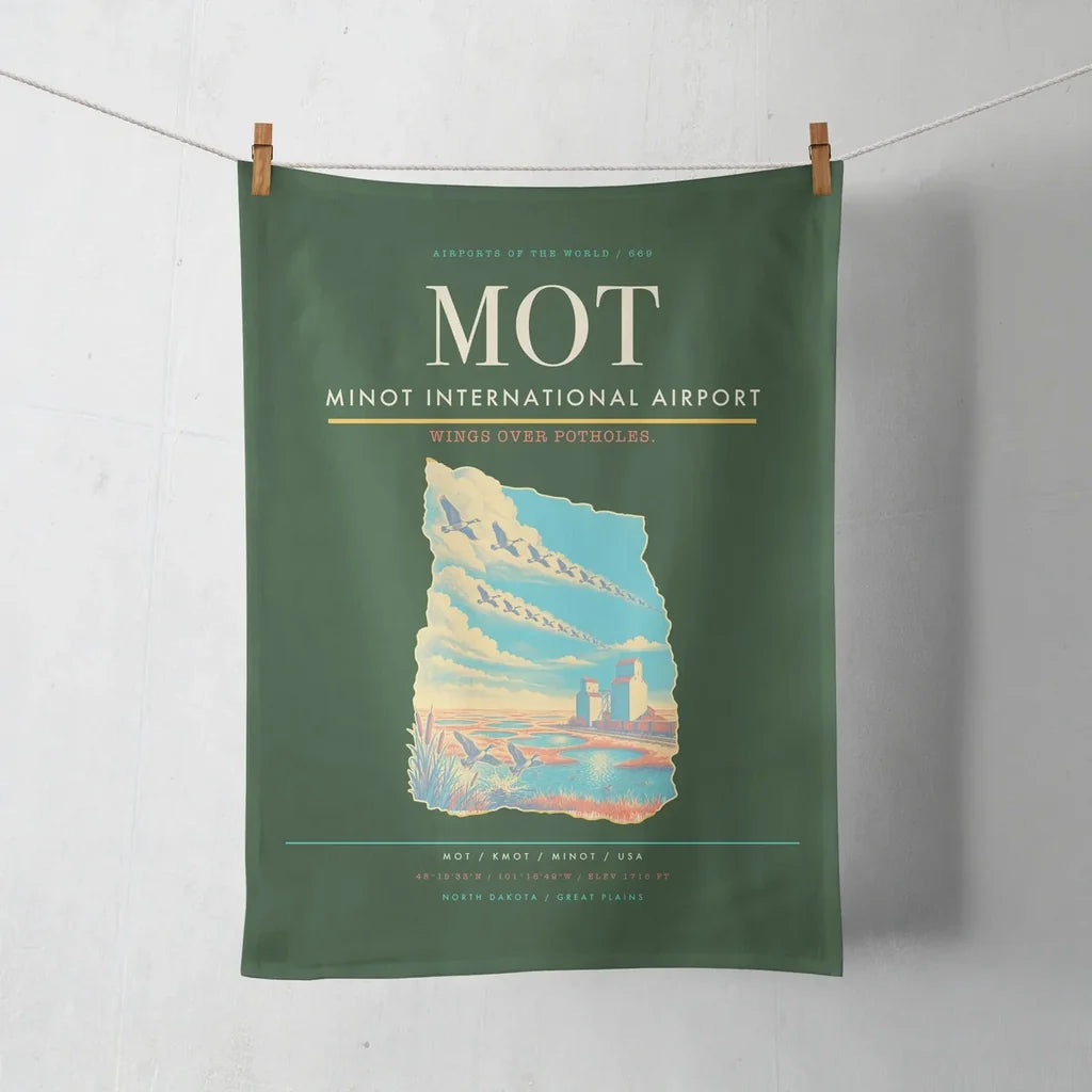 Minot International Airport (MOT) design on dark green towel