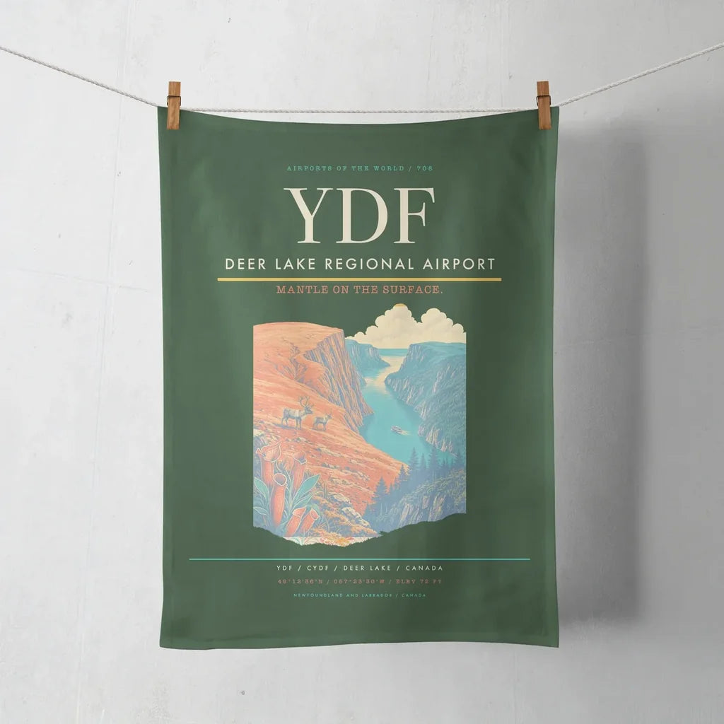 Deer Lake Regional Airport (YDF) design on dark green towel