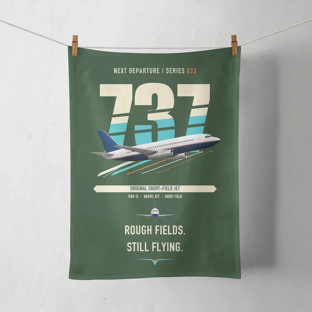 Boeing 737-200 design on dark green towel