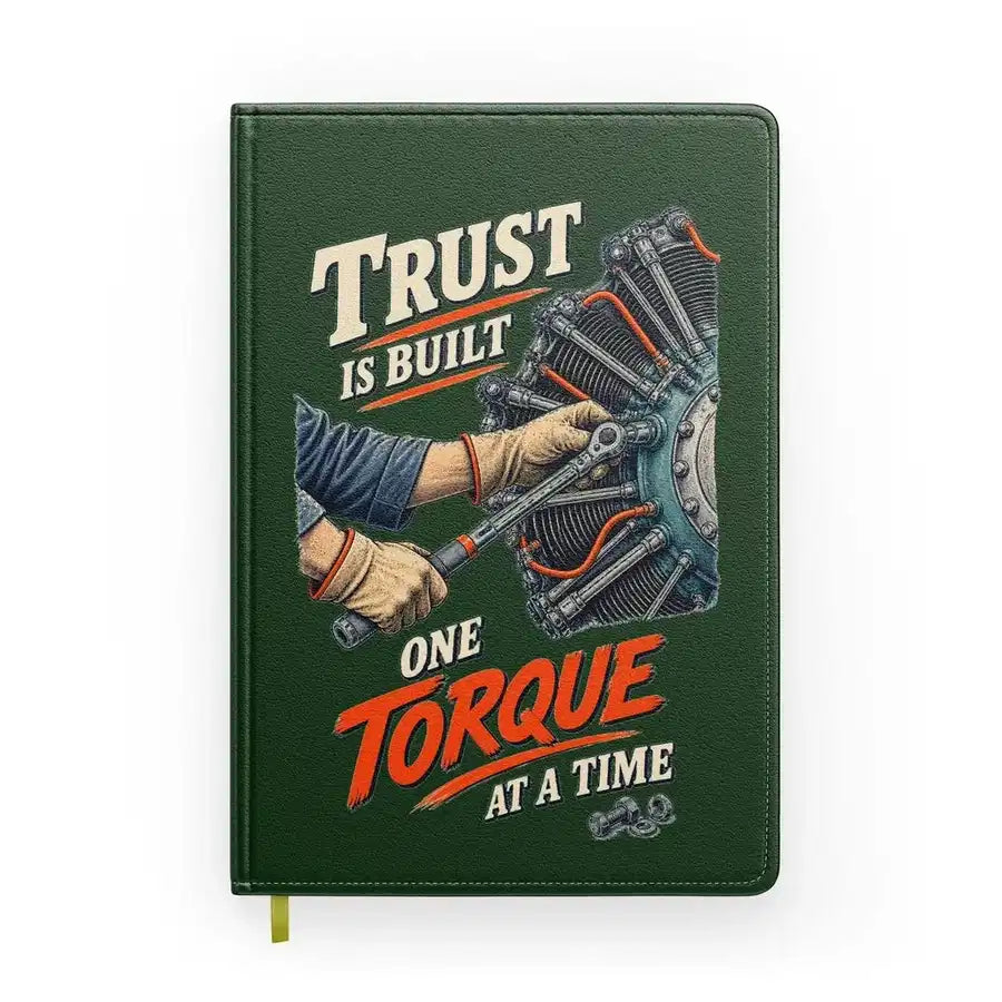 Trust Is Built One Torque At A Time design on dark green notebook