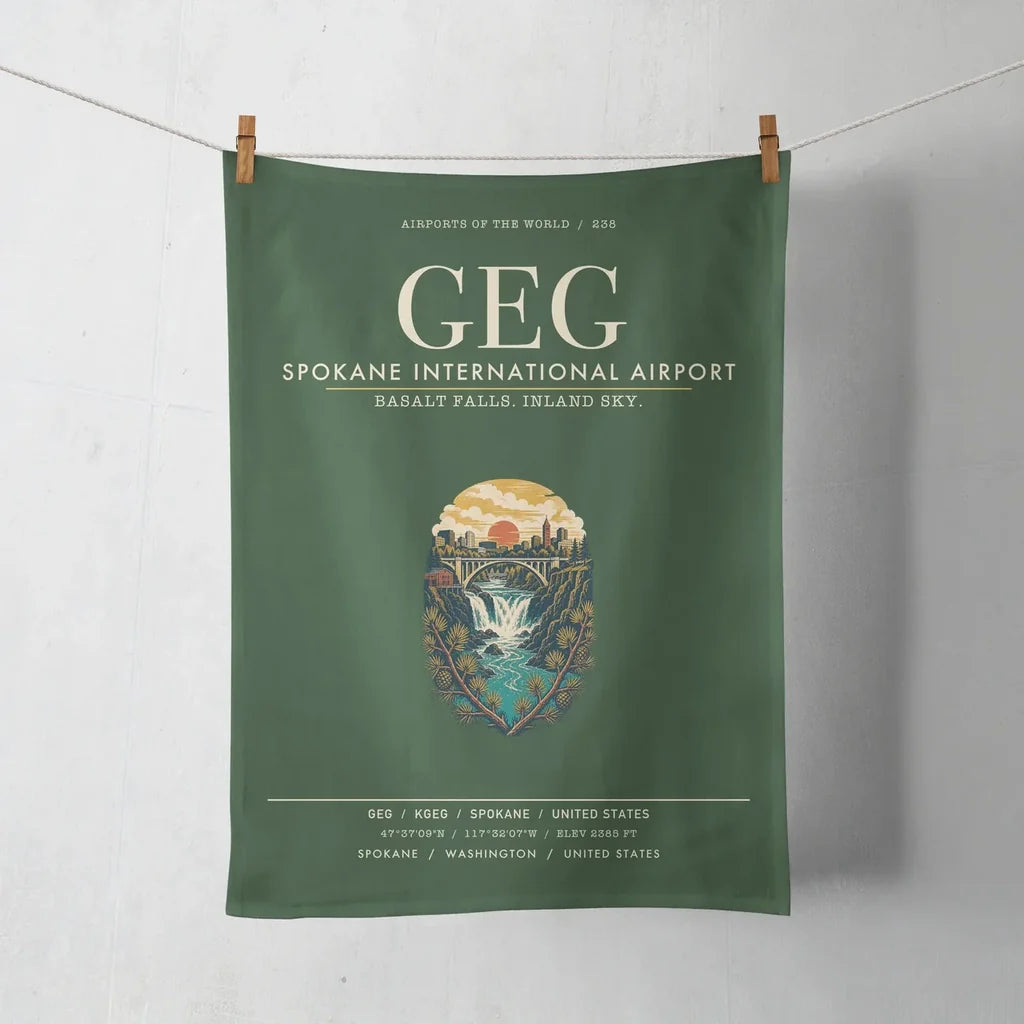 Spokane International Airport (GEG) design on dark green towel