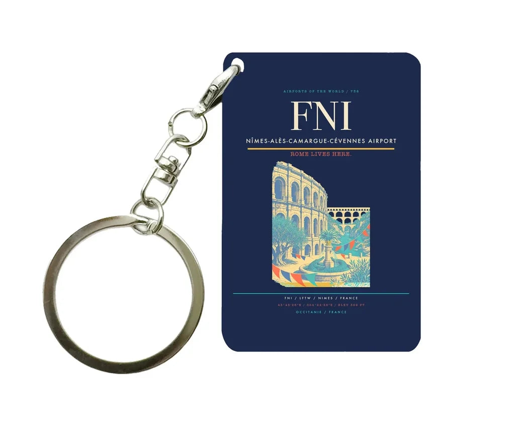 Nîmes-Alès-Camargue-Cévennes Airport (FNI) design on navy blue key chain