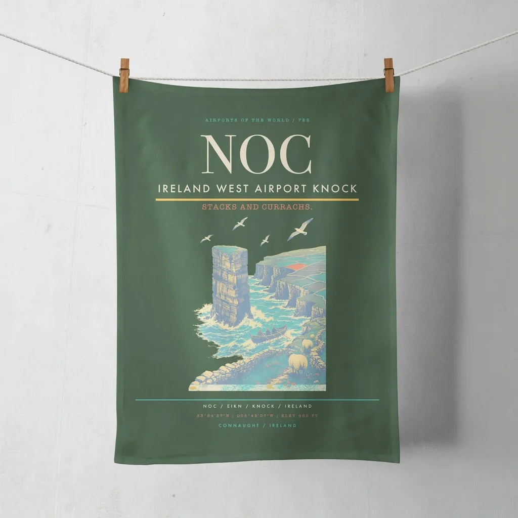 Ireland West Airport Knock (NOC) design on dark green towel